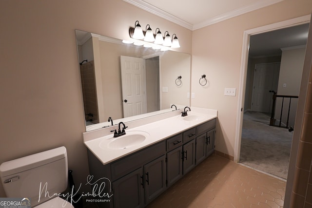 bathroom with ornamental molding, toilet, tile patterned flooring, and vanity