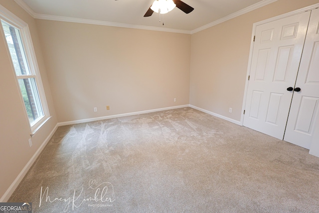 4804 Brittany Dr, Macon, GA 31210 - carpeted empty room with a ceiling fan and crown molding