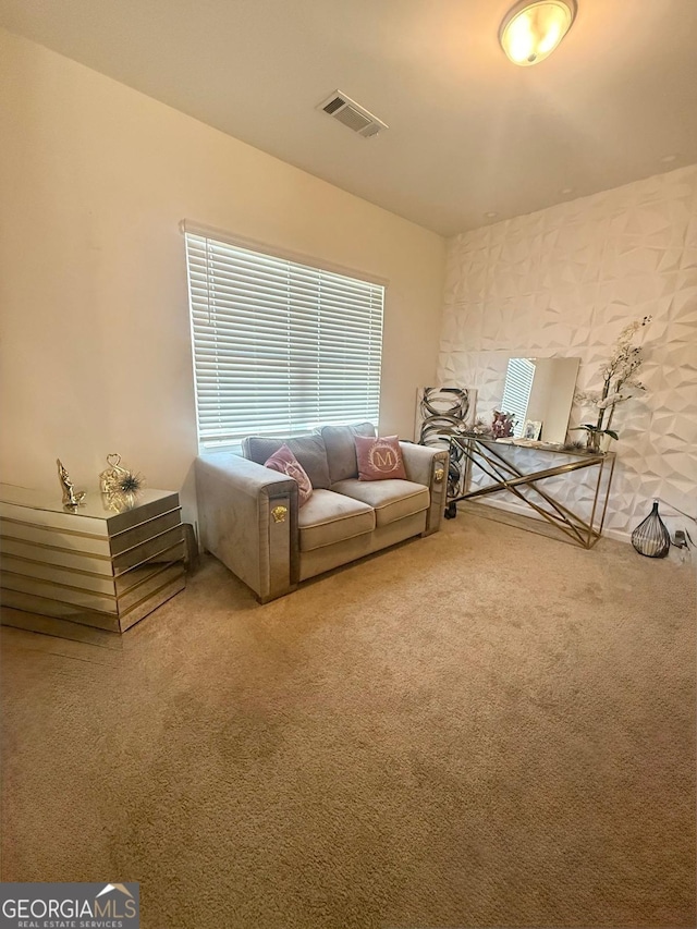 unfurnished living room with carpet floors