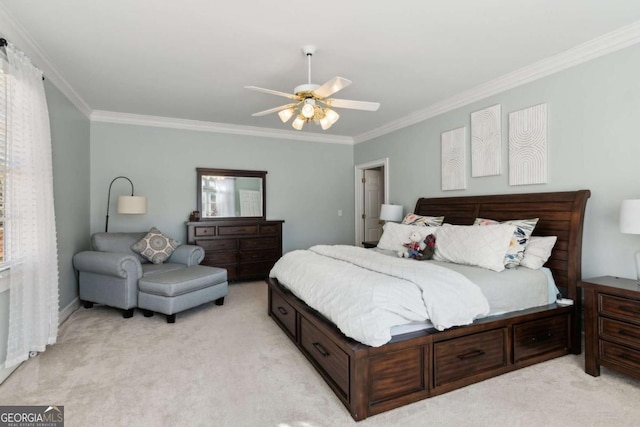 bedroom with crown molding, light colored carpet, and ceiling fan