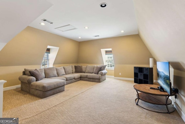 carpeted living room with lofted ceiling