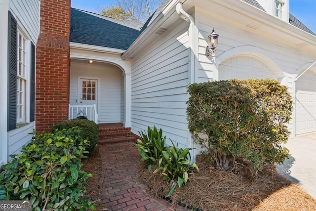 property entrance featuring a garage