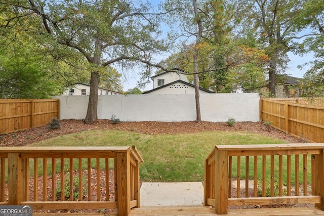 view of yard featuring a patio area and a fenced backyard