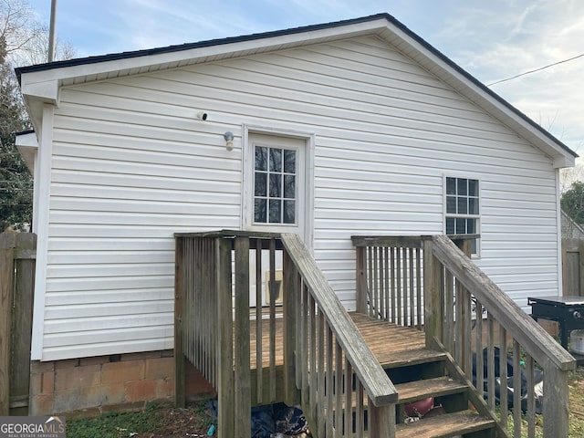 rear view of house with a deck