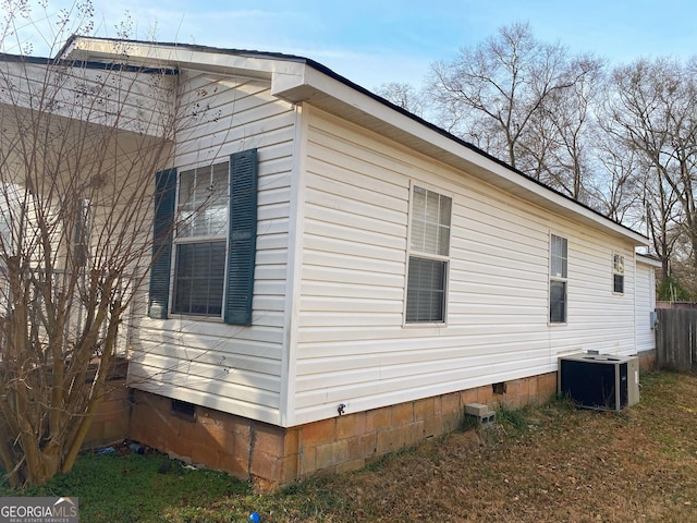 view of side of property featuring cooling unit