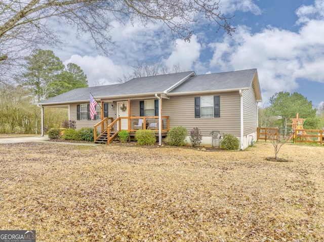 view of front of home featuring covered porch