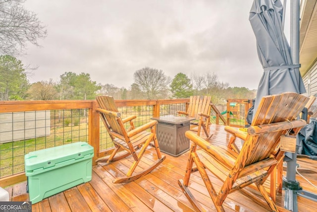 deck featuring a fire pit