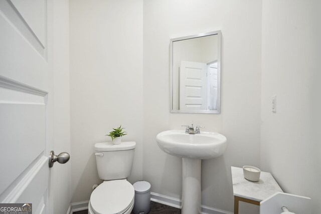 815 Taurus Dr, Stockbridge, GA 30281 - bathroom featuring sink and toilet