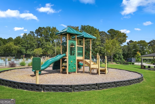 815 Taurus Dr, Stockbridge, GA 30281 - view of playground featuring a yard