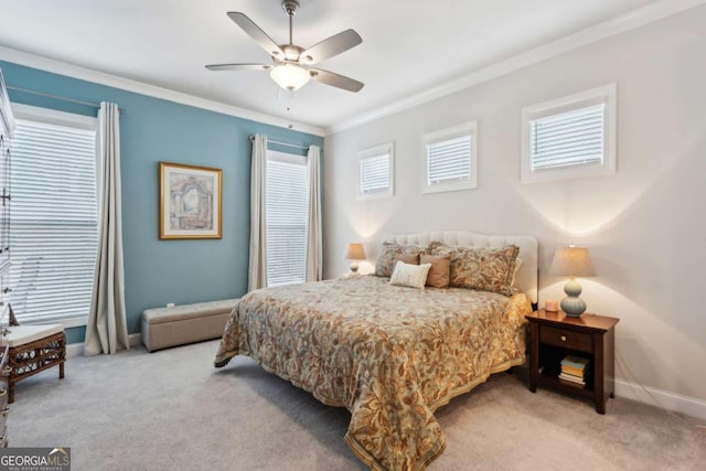 bedroom with light carpet, crown molding, and ceiling fan