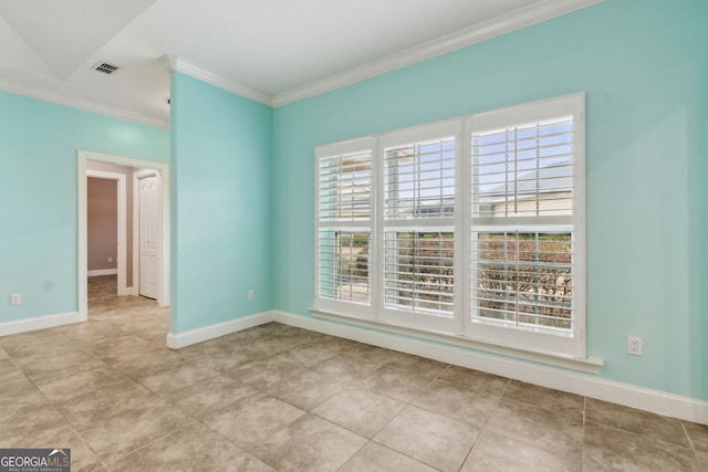 17 Coastal Walk, Saint Marys, GA 31558 - empty room with crown molding and light tile patterned flooring