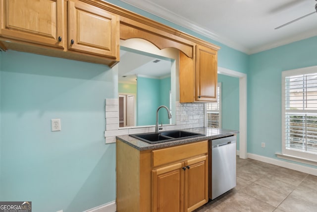 17 Coastal Walk, Saint Marys, GA 31558 - kitchen with light tile patterned flooring, sink, tasteful backsplash, stainless steel dishwasher, and ornamental molding