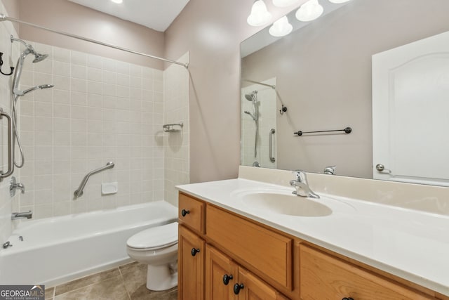 17 Coastal Walk, Saint Marys, GA 31558 - full bathroom with tiled shower / bath combo, vanity, tile patterned floors, and toilet