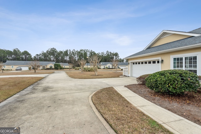 17 Coastal Walk, Saint Marys, GA 31558 - view of yard with a garage
