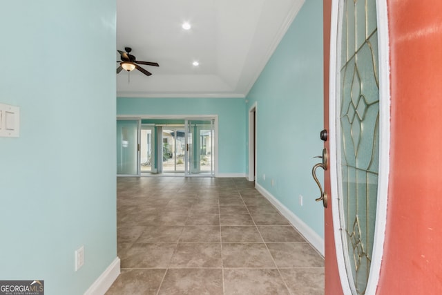 17 Coastal Walk, Saint Marys, GA 31558 - entryway with ceiling fan, ornamental molding, a raised ceiling, and light tile patterned floors