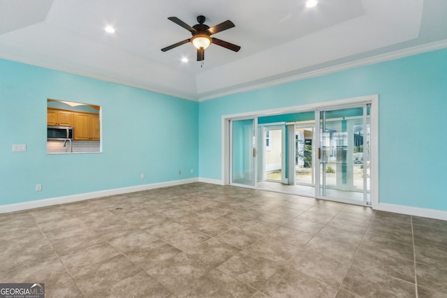 17 Coastal Walk, Saint Marys, GA 31558 - spare room featuring a raised ceiling and ceiling fan
