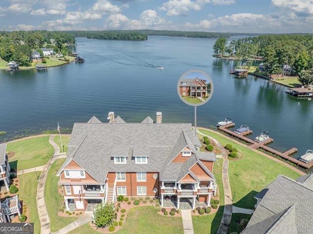 drone / aerial view with a water view