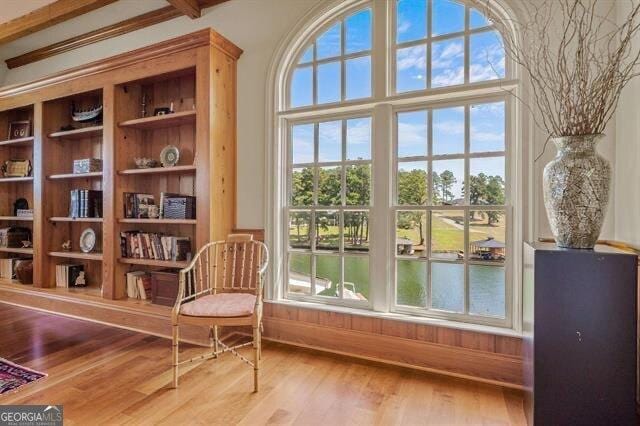 living area with hardwood / wood-style flooring