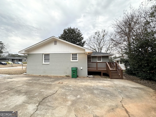 rear view of house with a deck