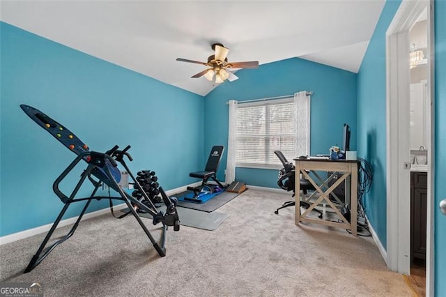 exercise area with vaulted ceiling, light carpet, and ceiling fan