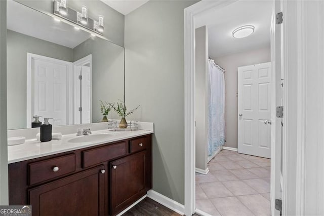 bathroom featuring tile patterned floors and vanity