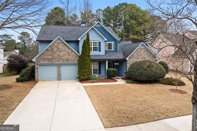 front of property with a garage