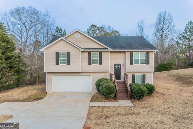 bi-level home featuring a garage