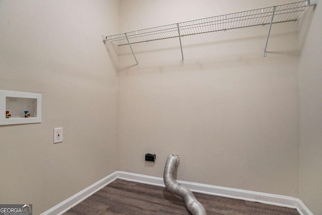 laundry area with dark hardwood / wood-style floors, hookup for a washing machine, and electric dryer hookup