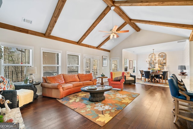 living area with visible vents, ceiling fan with notable chandelier, high vaulted ceiling, beam ceiling, and dark wood-type flooring