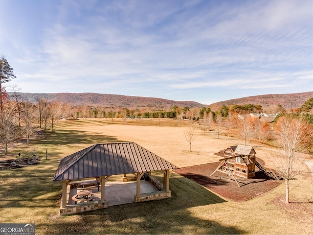 view of yard featuring a rural view, a mountain view, and a gazebo