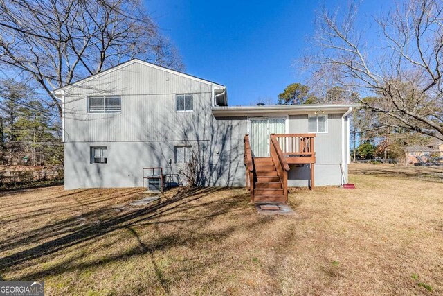 back of house with a yard