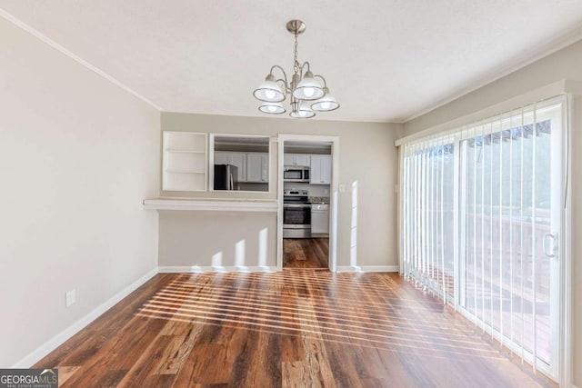 unfurnished dining area with a notable chandelier and dark hardwood / wood-style floors