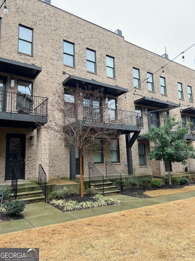 1028 Robert Smalls Way, Atlanta, GA 30318 - view of property with brick siding