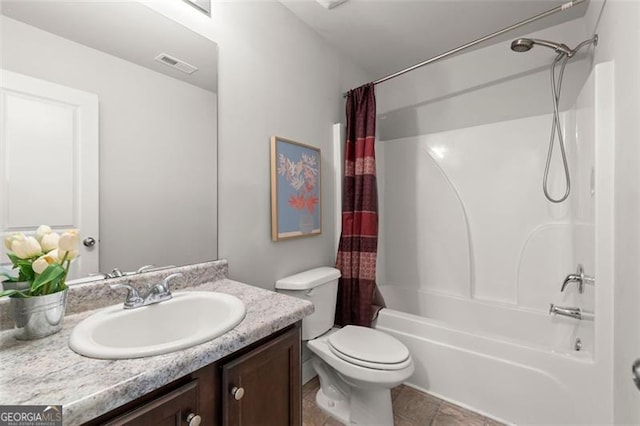 full bathroom featuring vanity, toilet, and shower / bath combo with shower curtain