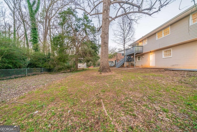 view of yard featuring a wooden deck