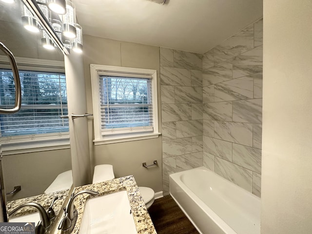 1158 Edgefield Dr SW, Atlanta, GA 30310 - full bath featuring vanity,  shower combination, and wood finished floors