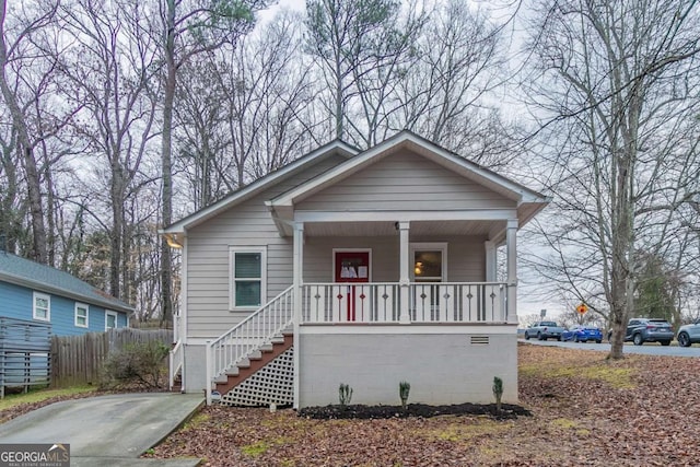 bungalow-style home with a porch