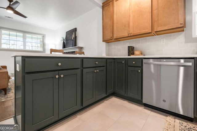 kitchen featuring ceiling fan, stainless steel dishwasher, decorative backsplash, and light tile patterned floors