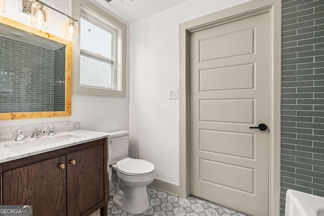 full bathroom featuring independent shower and bath, vanity, and toilet