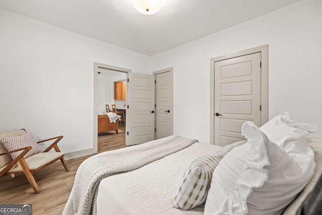 bedroom featuring light hardwood / wood-style floors