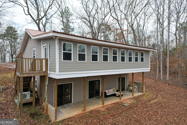 rear view of house featuring a patio area