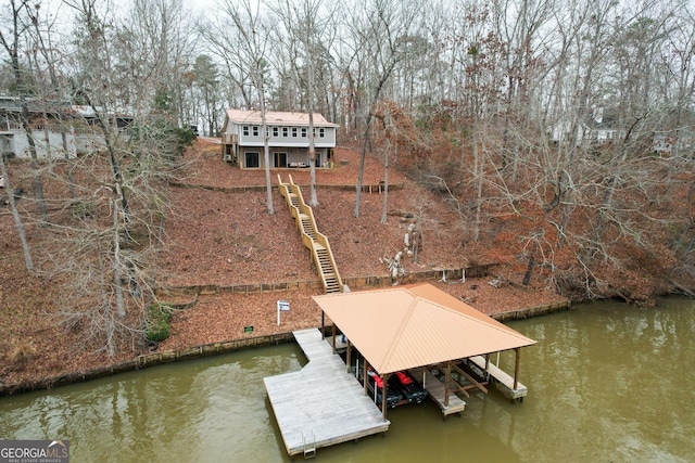 dock area with a water view