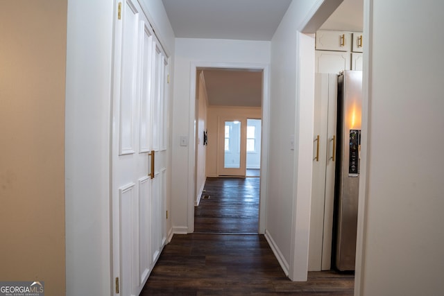 corridor with dark hardwood / wood-style floors