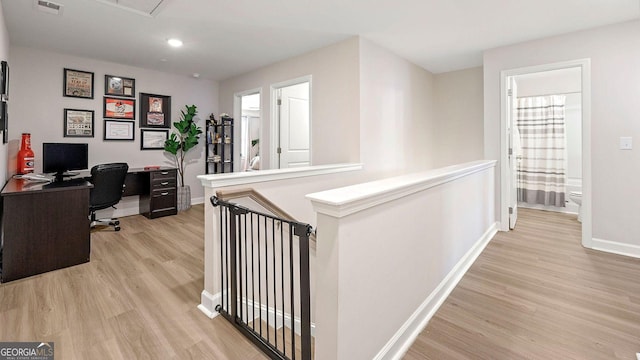 home office with light wood-type flooring