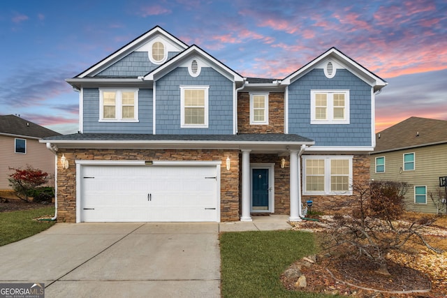 craftsman inspired home with a garage