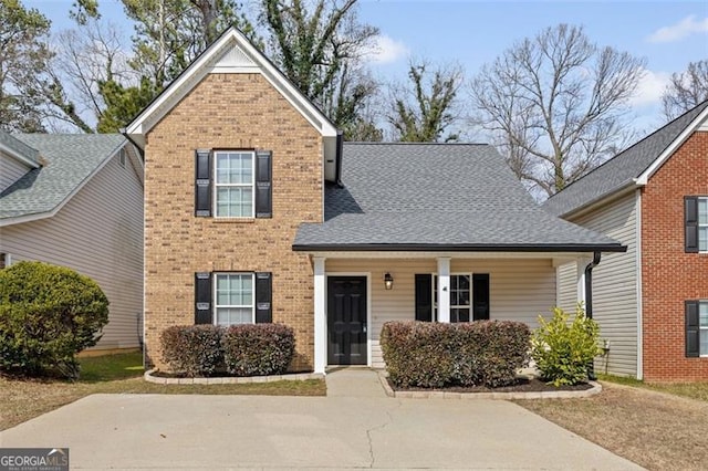 front of property featuring covered porch