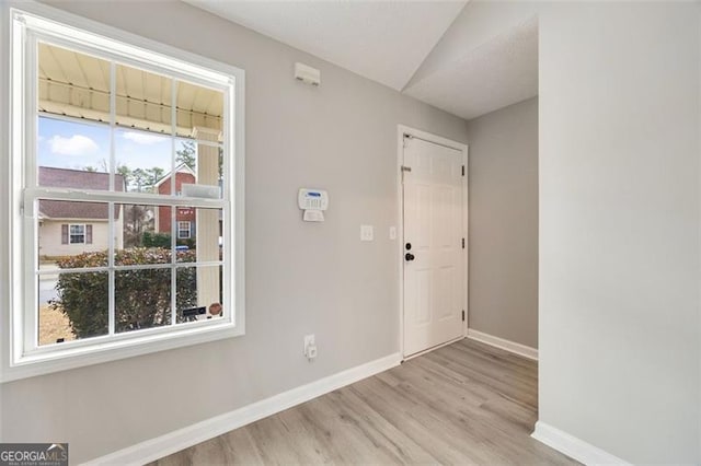 foyer featuring light wood-type flooring