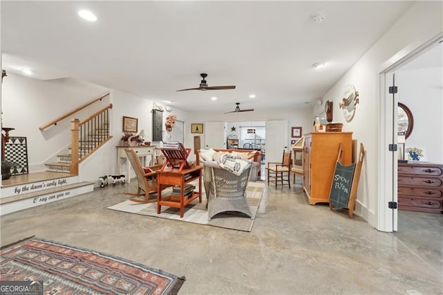 living room featuring ceiling fan