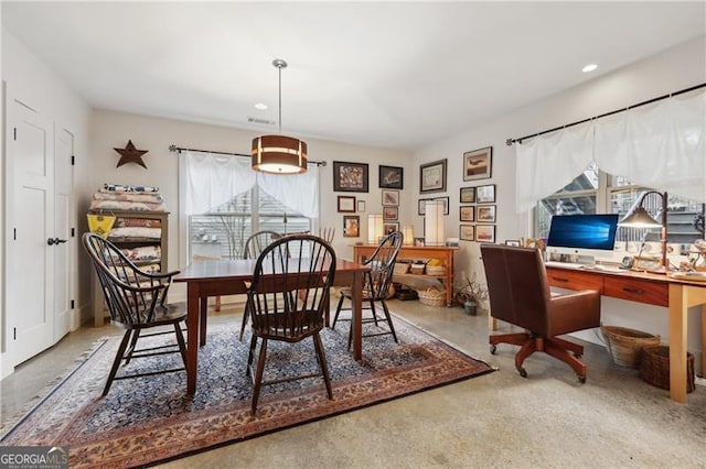 dining room with a healthy amount of sunlight