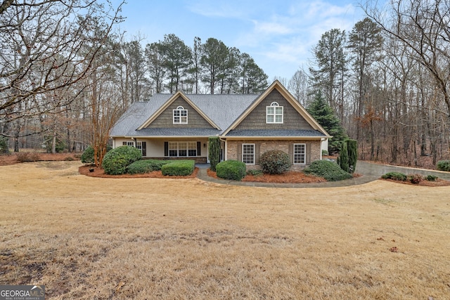 craftsman house with a front yard